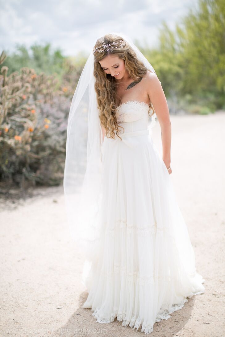 Amanda ordered her flowing Inbal Dror gown without trying it on. She fell in love with the dress online and ordered it immediately. "I was able to try on another gown by her with a similar bodice, which helped, but I was confident in her gowns from the moment I saw them," she says.