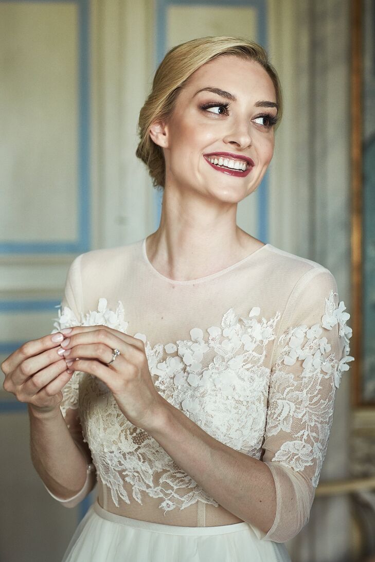 "I wanted the hair and makeup to fit my personal style and also to match my wedding gown, the venue and the alfresco wedding," Nina says. She wanted a soft but elegant updo, lipstick in a shade she typically wears, mascara and a "dewy and healthy" glow on her face. "My stylist Daniela was really incredible. I have actually followed her on Instagram because she is so fashionable and cool, and she immediately understood what look I was going for."