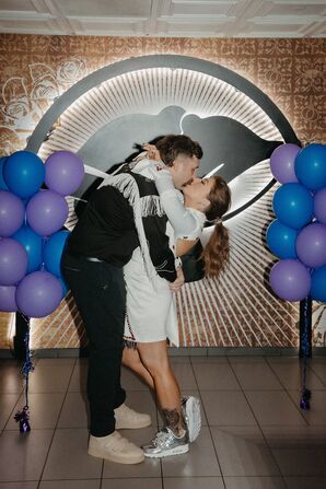Couple Kissing During Taco Bell Vow Exchange in Las Vegas