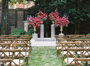 Outdoor Lawn Ceremony Altar With Fuchsia Arrangements and Greek Rug