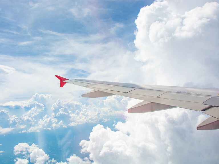 Flying through a sunny patch of fluffy clouds.
