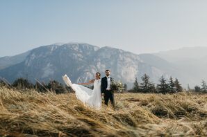 Adventurous Couple Posing for Wedding Photos in the Canadian Mountains