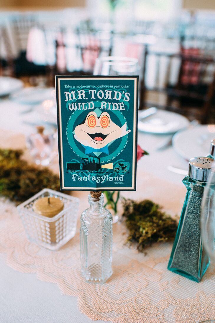 Their Disney inspiration also made its way into the reception. The couple used vintage theme park posters to name every table atop a glass apothecary bottle. “We wanted to incorporate Disney without going too crazy,” Kim says. The accents served as a burst of nostalgia and a nod to their favorite rides.