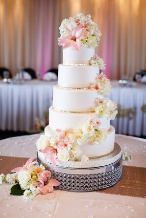 Five-Tier White Fondant Cake with Cascading Flowers