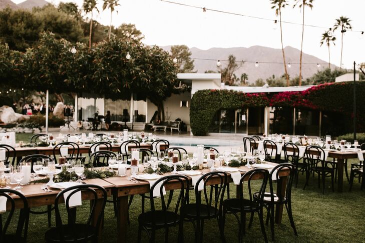 "We mixed classic, modern, gold and white table settings with farm tables and black bentwood chairs in two long rows," Anna says. "We wanted the dinner to feel cozy and elegant at the same time."