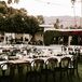 "We mixed classic, modern, gold and white table settings with farm tables and black bentwood chairs in two long rows," Anna says. "We wanted the dinner to feel cozy and elegant at the same time."