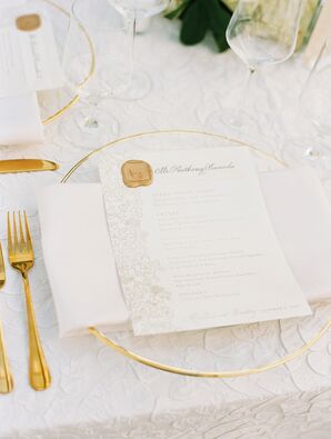 Glass Charger Plate With Gold Rim, Gold Flatware and Elegant Menu