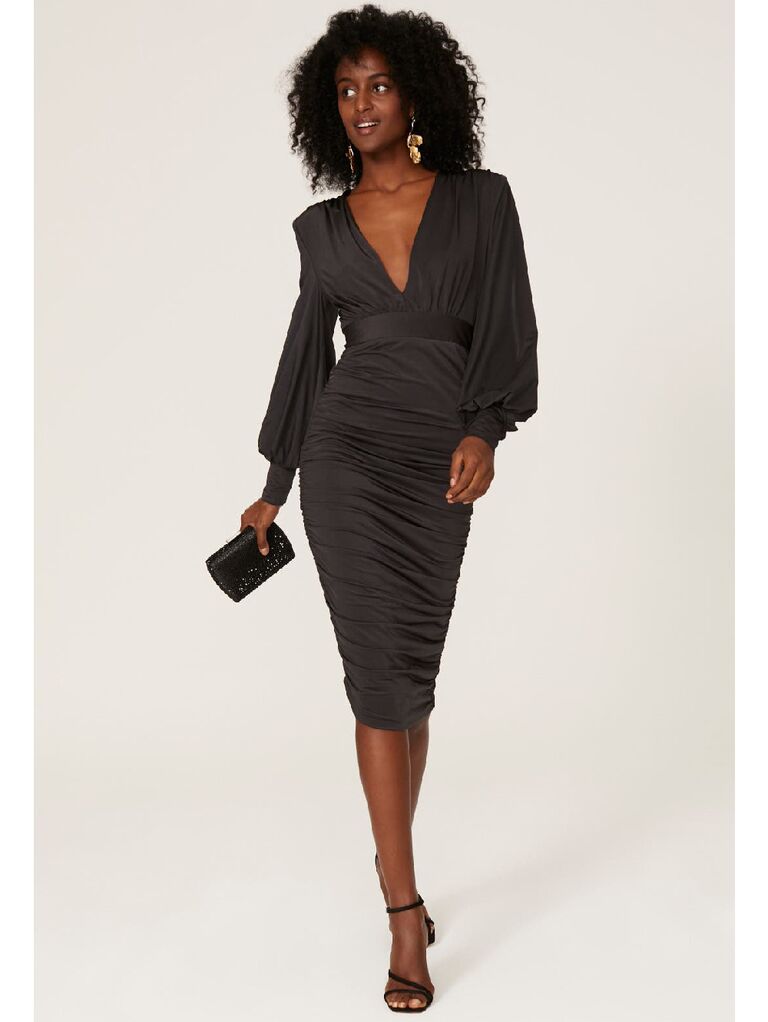 Black midi dress with v-neck and elongated cuff sleeves