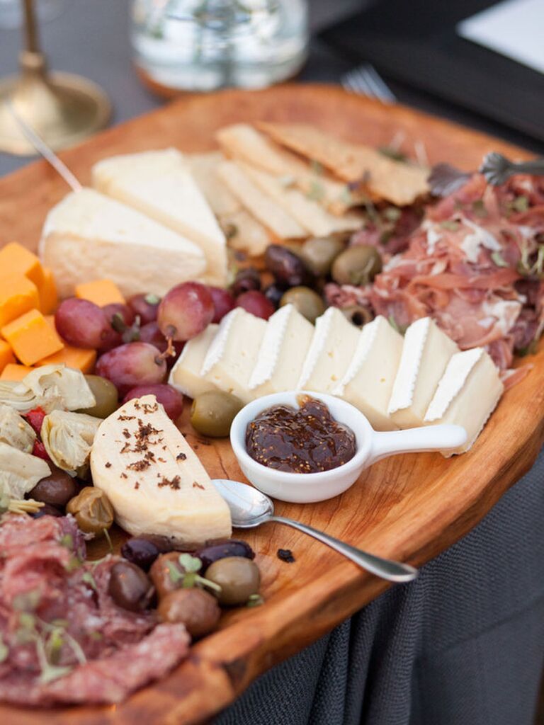 Charcuterie bridal shower spread with meat, cheese and fresh fruit