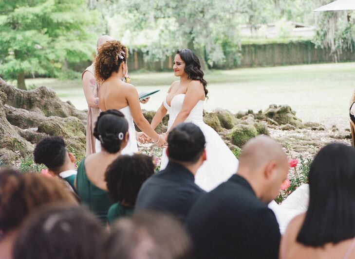 Couple Exchanging Vows During Minimony at the Tree of Life in Audubon Park in New Orleans
