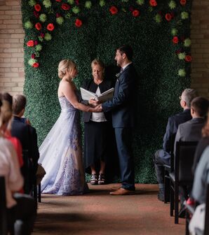 Green and Red Floral Ceremony Backdrop