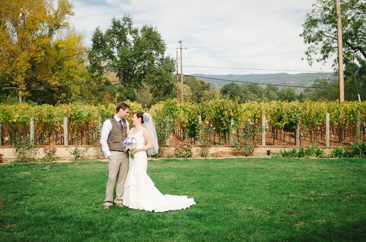 The style of Tracey and Adam's wedding was casual with a stunning backdrop of the vineyard and trees. "We mostly let nature be our decorations," says the bride.