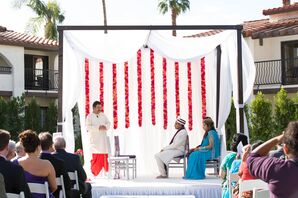 Red and White Draped Wedding Arch