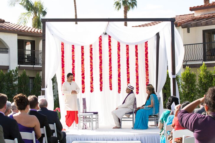 Red and White Draped Wedding Arch