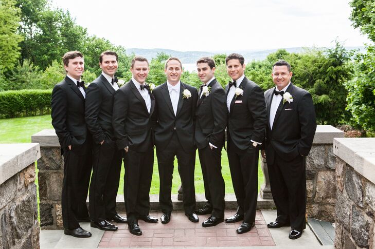 The groom and groomsmen looked sharp in matching dark tuxedos. The groomsmen all wore black bow-ties while Mark wore a white one.