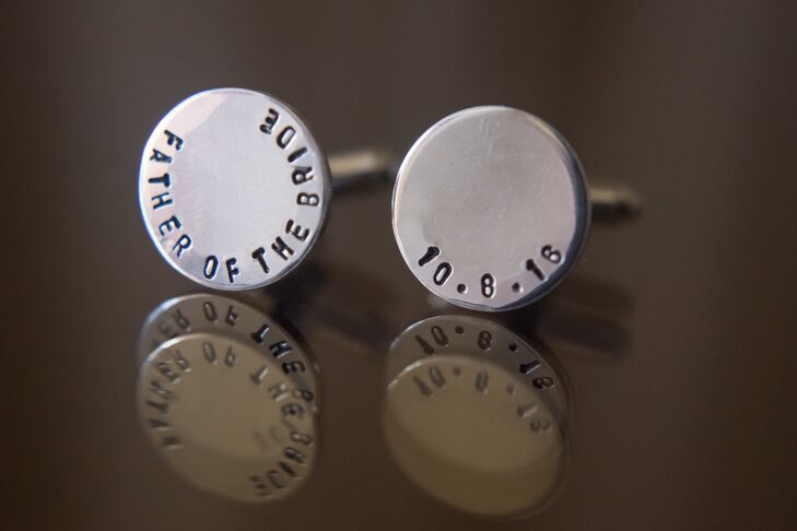 Jenna's father sported a pair of custom silver cuff links for the wedding day. They were engraved with "Father of the Bride" and the wedding date.