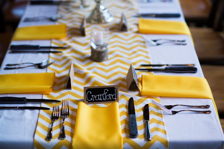 The couple decorated their reception with canary yellow linen napkins and yellow and white chevron table runners. “I feel like it really filled the space with color and fun,” Jessica says.