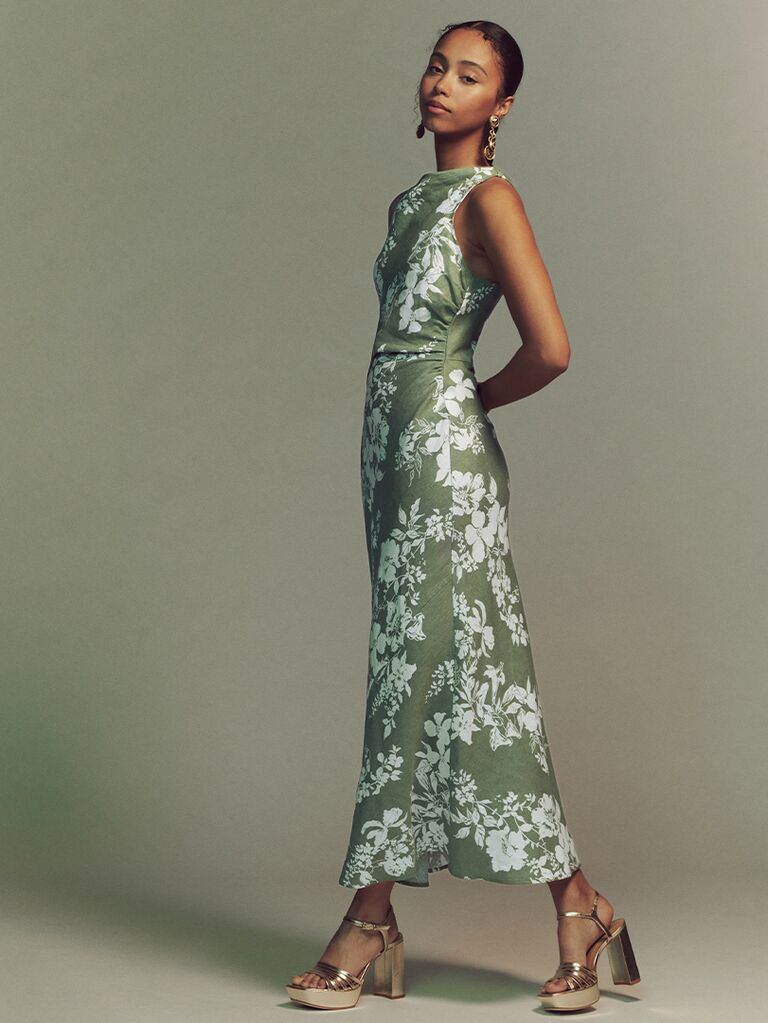 Linen maxi dress in green and white floral print with open back from Reformation