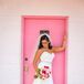 The bride donned a white trumpet style gown by David Tutera, a medium-length veil and light pink pumps.