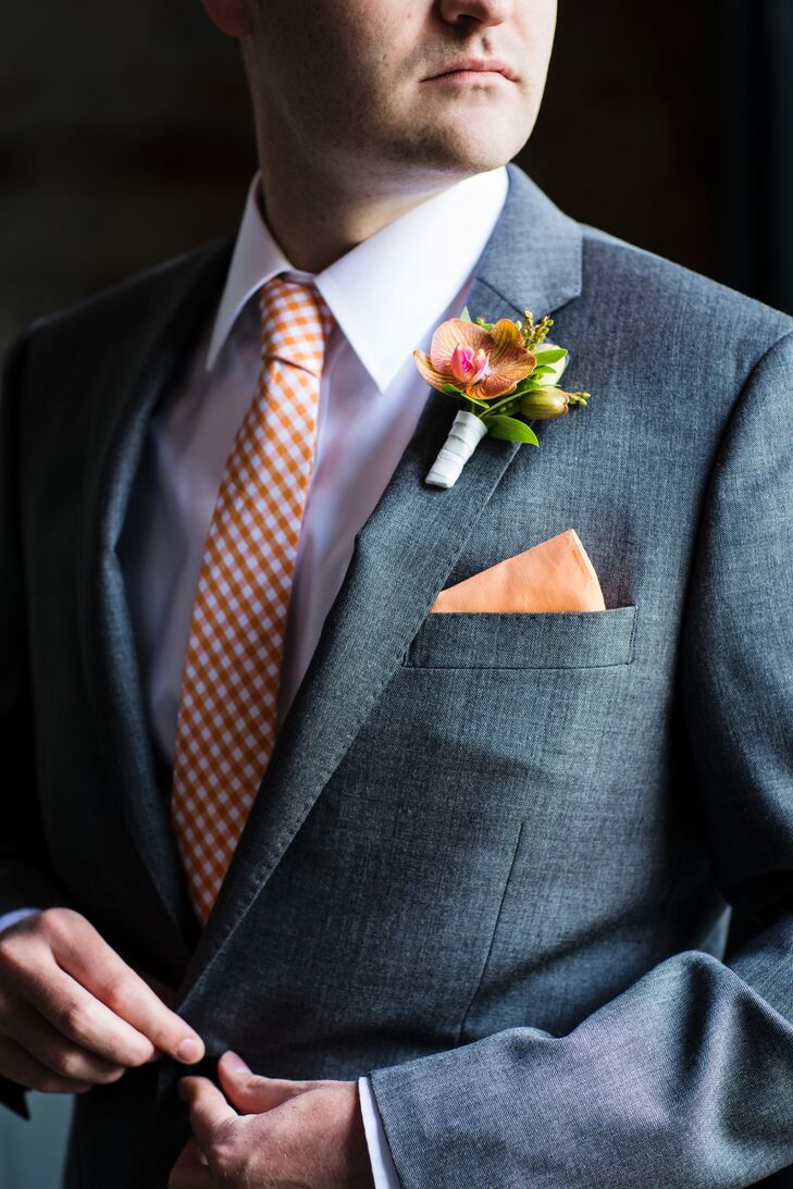 Since orchids are Molly's favorite flower, she included them throughout the decor. They were in her bouquet, and Boston's boutonniere was an orange orchid. Munster Rose did an amazing job bringing Molly and Boston's vision to life and tying all the florals together without making them identical.