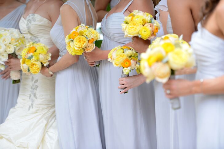 Bridesmaids wore silvery purple Amsale bridesmaid dresses that were floor-length.