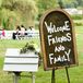 For DIY elements, Lauren and Matt had various chalkboard signs throughout their reception. One, wooden-framed sign welcomed guests to the ceremony.