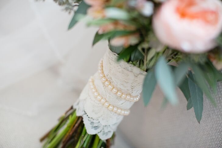 The stems of Mary's bouquet were wrapped with lace and pearls that had belonged to her grandmother. "It was a special way to honor her and have her close to my heart on my wedding day," she says.