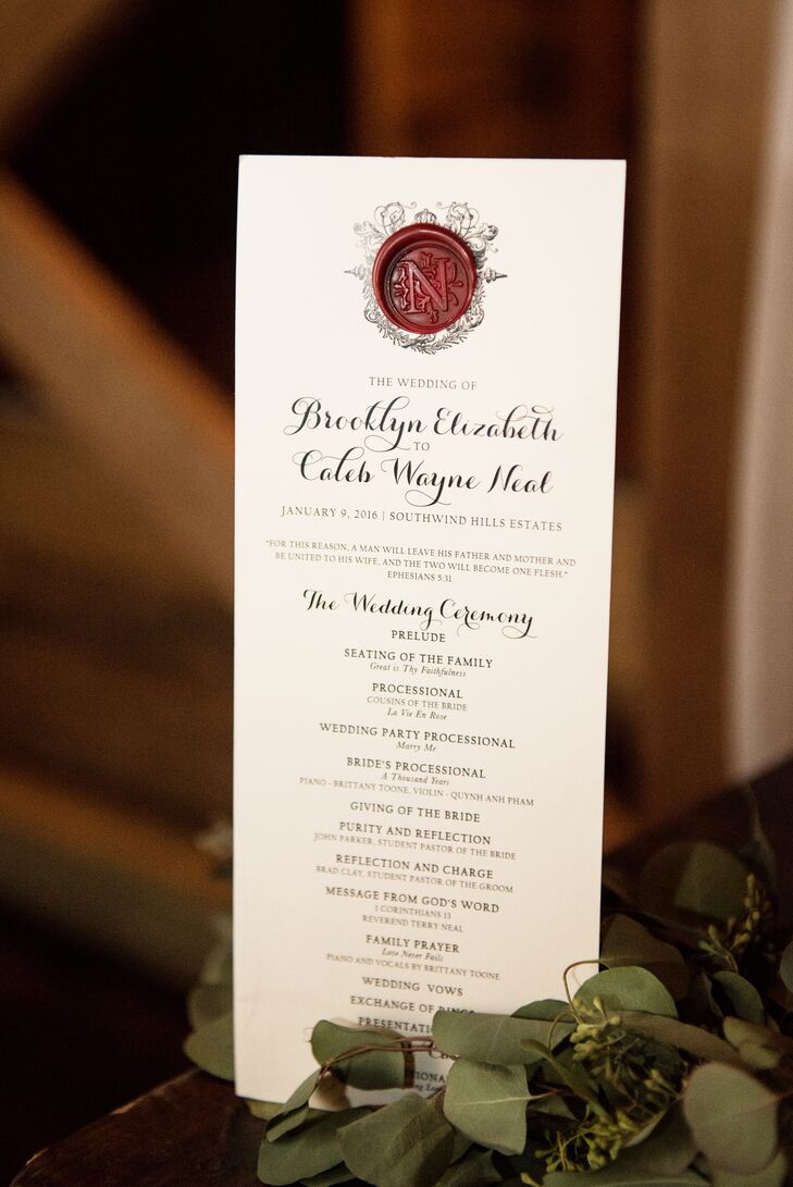 Each printed invitation was personally adorned with a bordeaux wax seal in the center of a crest and wrapped in bordeaux velvet ribbon. The programs for the ceremony were hand-stamped in exactly the same way.