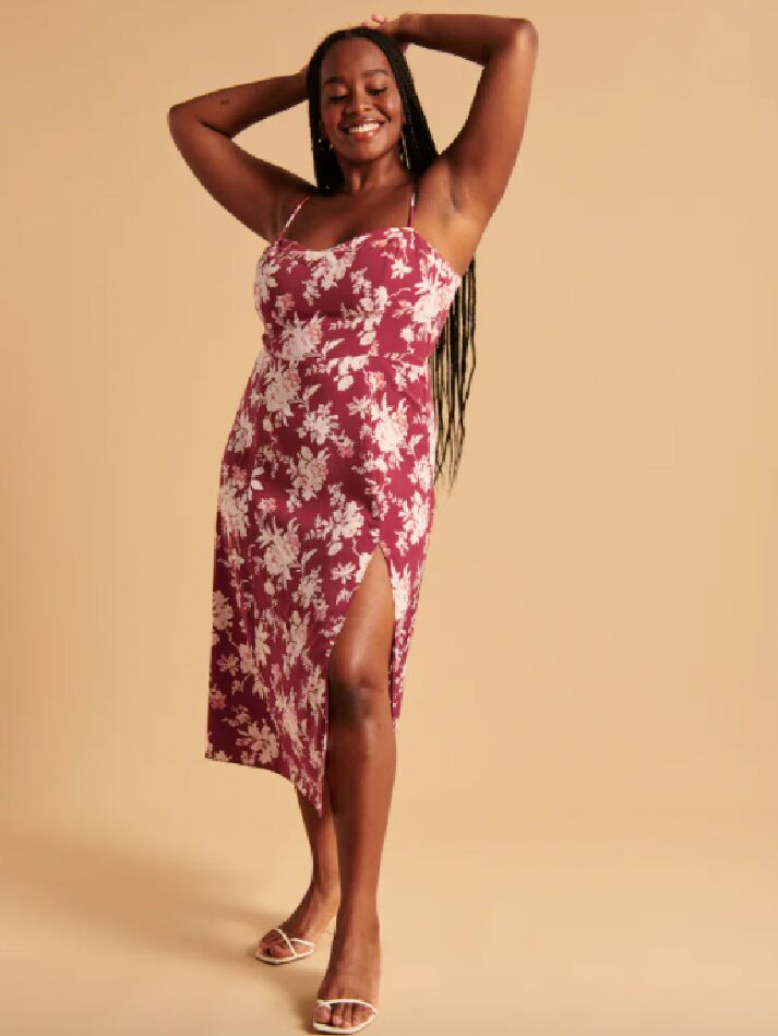 Red midi dress with white floral print and leg slit