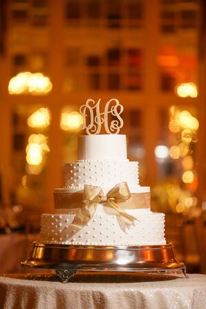 White Wedding Cake With Swiss Dots and Gold Ribbon