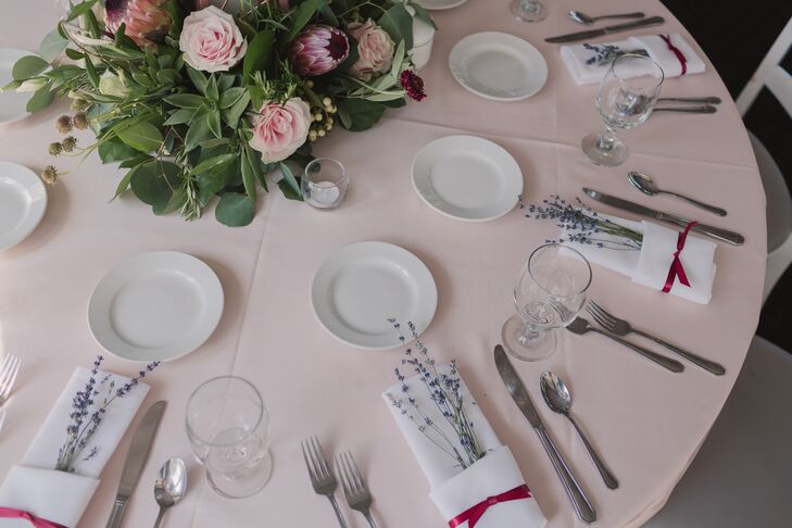 Pink and White Place Setting with Lavender Sprigs in Napkin