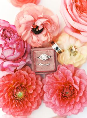 Halo Engagement Ring in Ring Box Surrounded by Dahlias