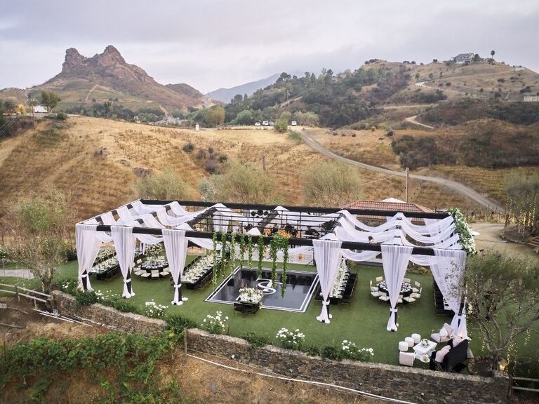 Outdoor wedding reception at ranch in Malibu, California