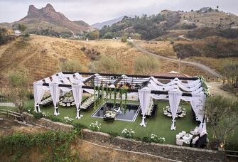 Outdoor wedding reception at ranch in Malibu, California