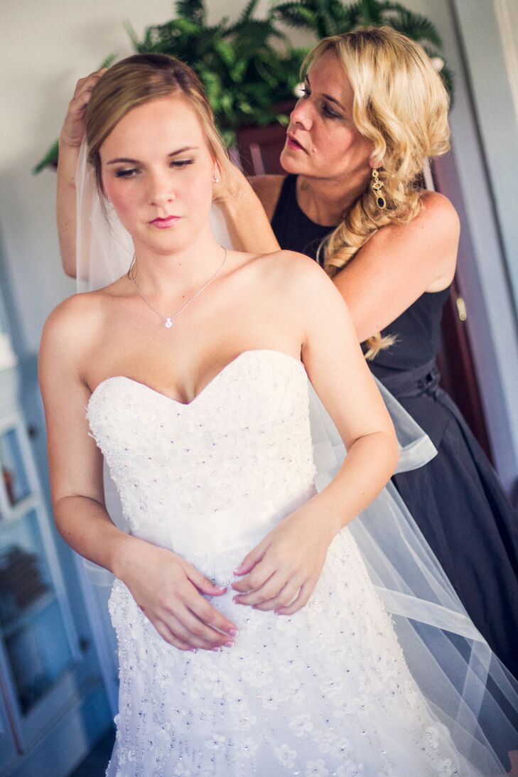 Bride Getting Ready in Strapless Ball Gown