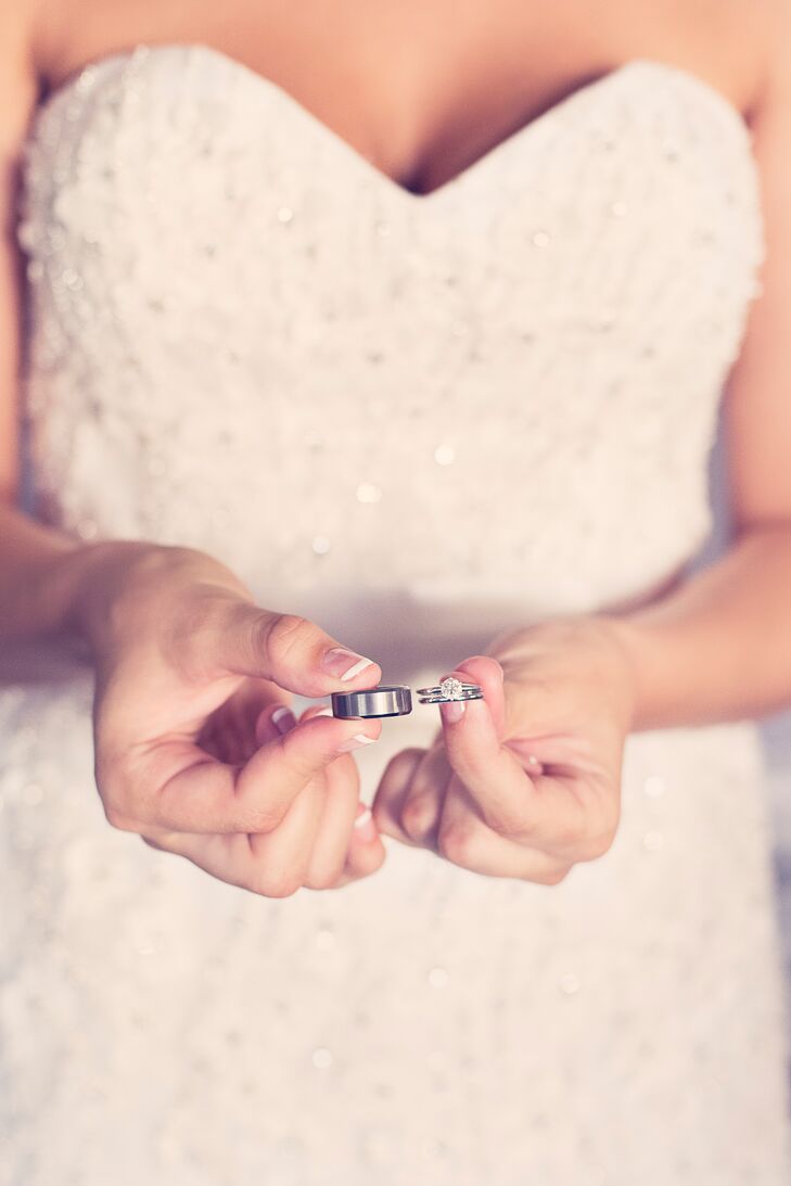 The groom proposed to the bride on the beach in Santa Monica, California with a round-cut solitaire ring on a white gold band. The groom had a matching white gold wedding band.