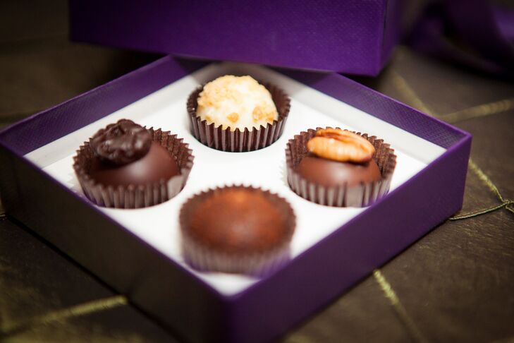 Stanley and Jason sent their friends and family members home with a few sweet treats, decadent Vosges chocolates wrapped in regal purple boxes. The boxes were displayed on a vintage buffet cart for guests to take as they made their exit.