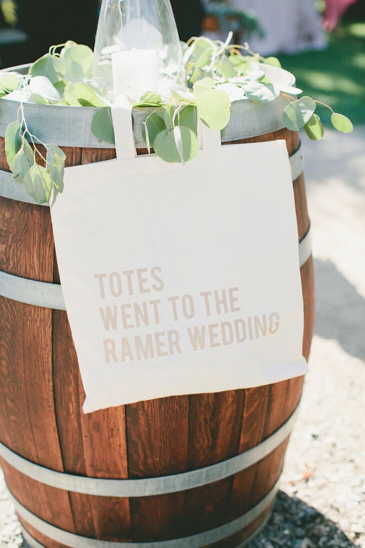 Wanting to give their families and friends something to remember the wedding by, Cara and Scott had custom totes made for their guests. The favor combined personality and practicality and also captured the day’s simple, elegant feel.