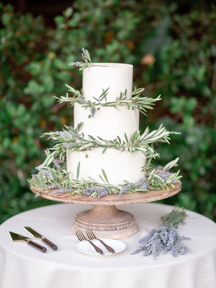 Rustic Tiered Cake Decorated with Lavender on Wood Stand
