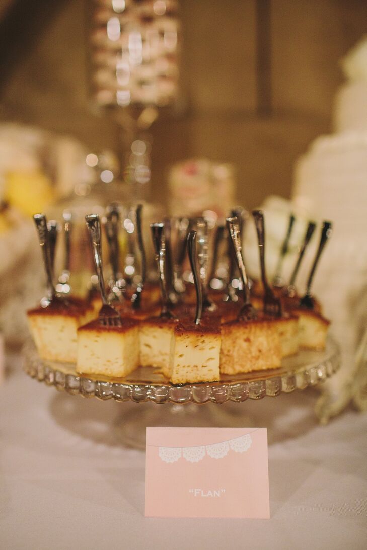Individual silver forks were placed in personal squares of flan for dessert.