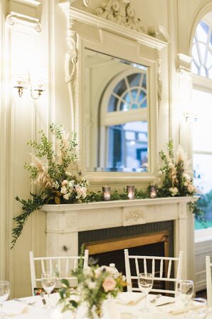 White Mantle with Flower Arrangements and Candles
