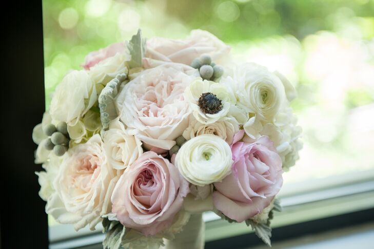 Katleyn's pink and ivory bouquet included garden roses, ranunculus and anemone.