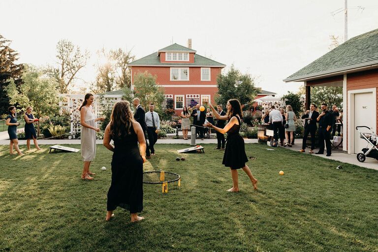 Wedding guests playing Spikeball