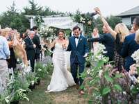 Bride and groom exiting ceremony