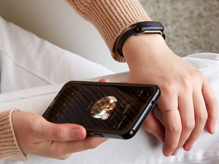 Woman wearing physical touch long-distance bracelet gift
