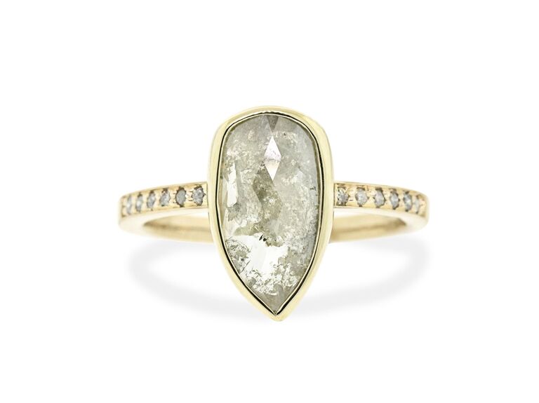 salt and pepper pear shaped diamond engagement ring in yellow gold setting