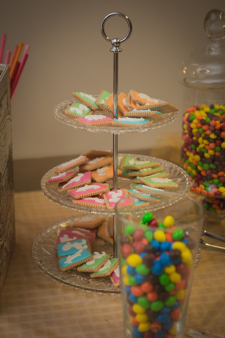 Trays and jars of cookies and candies were offered to guests as a delicious sweet treat in addition to the cake.