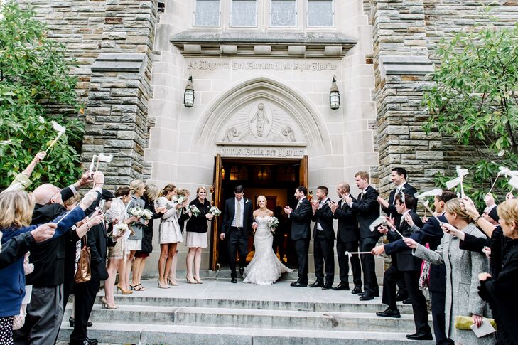 After the ceremony, Corinne and John exited the Alumni Chapel at Loyola University Maryland. Their wedding party stood on both sides of the large doors, awaiting to greet and congratulate the newlyweds.