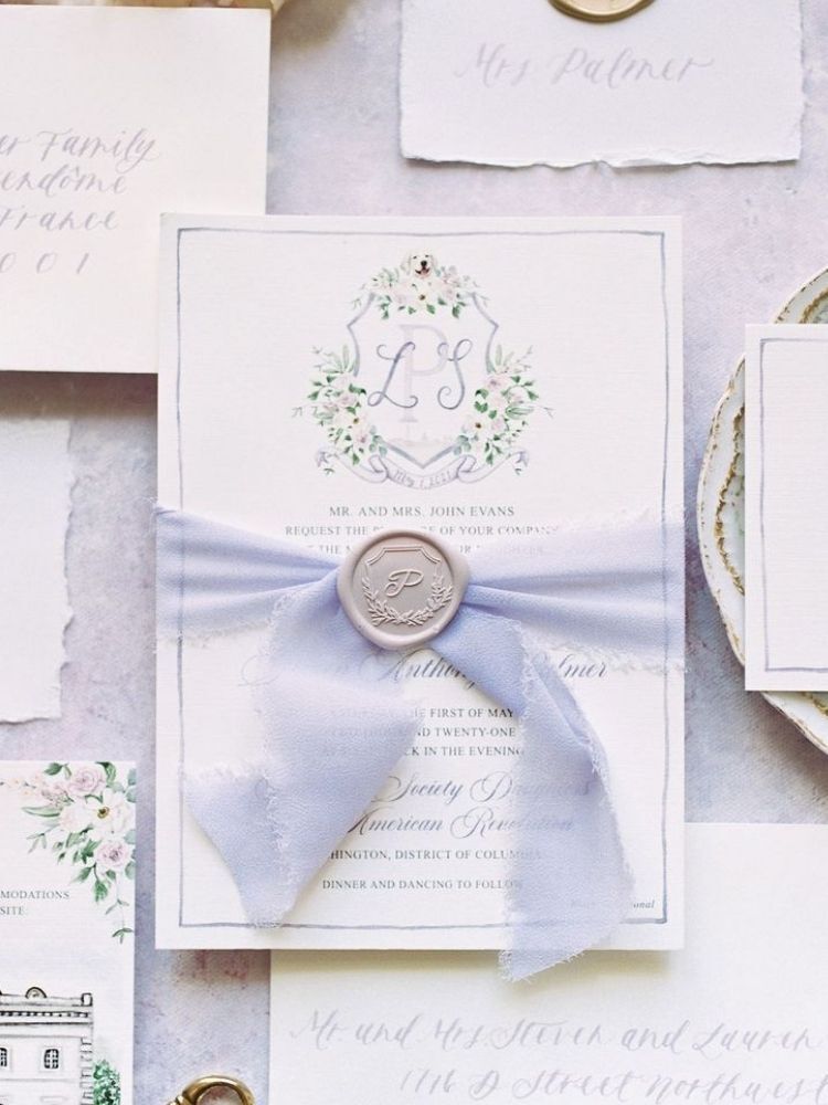 wedding invitation suite with dog-themed crest
