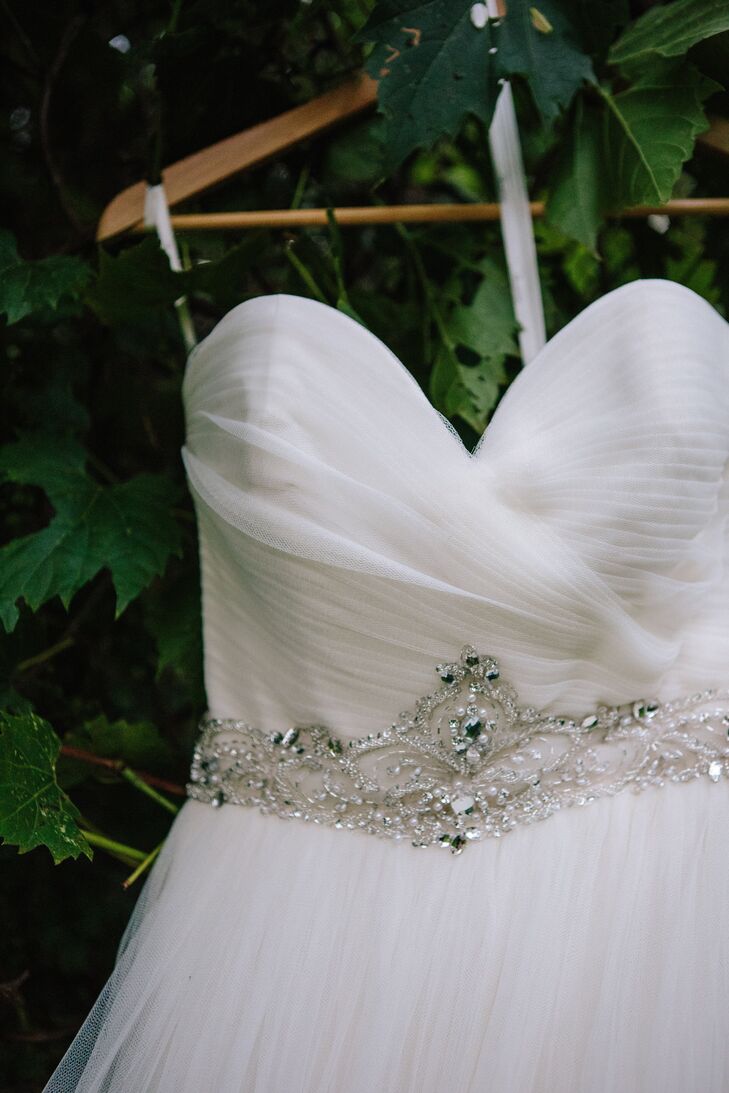Jessica's lovely A-line tulle gown featured a ruched bodice with an ornate jewel belt.